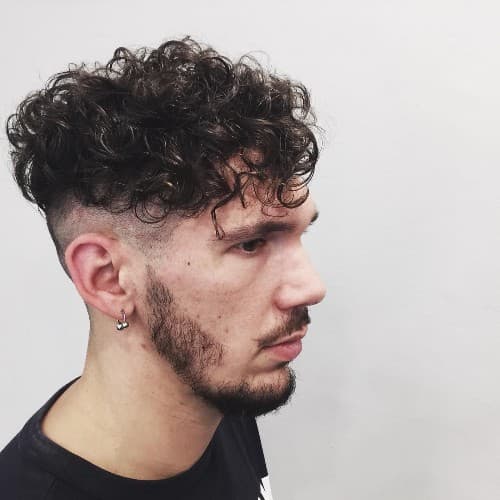 35 Best Haircuts For Boys With Curly Hair [2023]