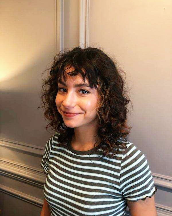 Curly Medium Length Cut + Bangs