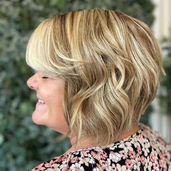 short haircut for women over 50 with curly hair
