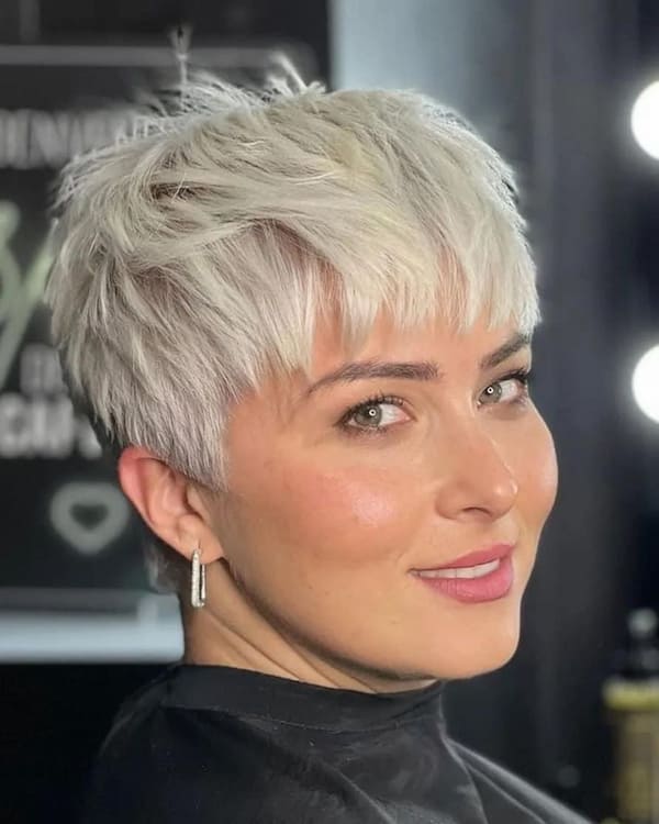 Blonde Pixie Bob Haircut with Loosen Fringe