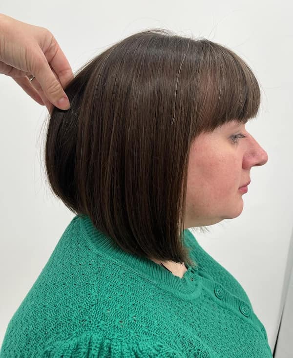 Sleek Angled Bob Haircut with Fringe