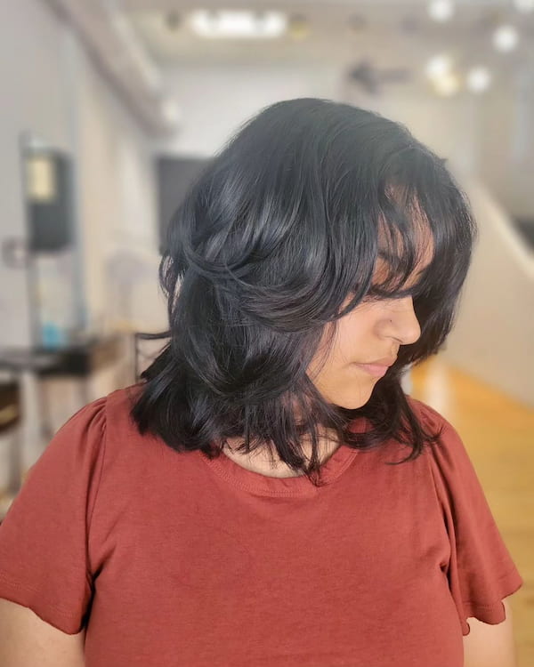 Black Lob Haircut with Layers and Bangs