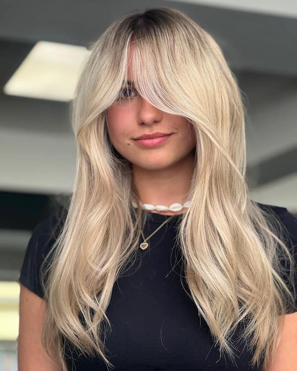 Blonde Layered Summer Hair with Curtain Bangs