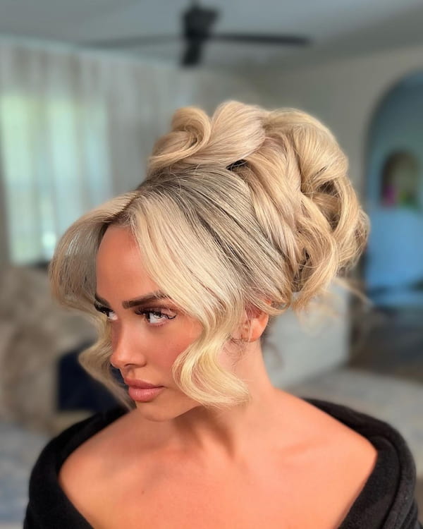 Voluminous Updo with Curtain Bangs