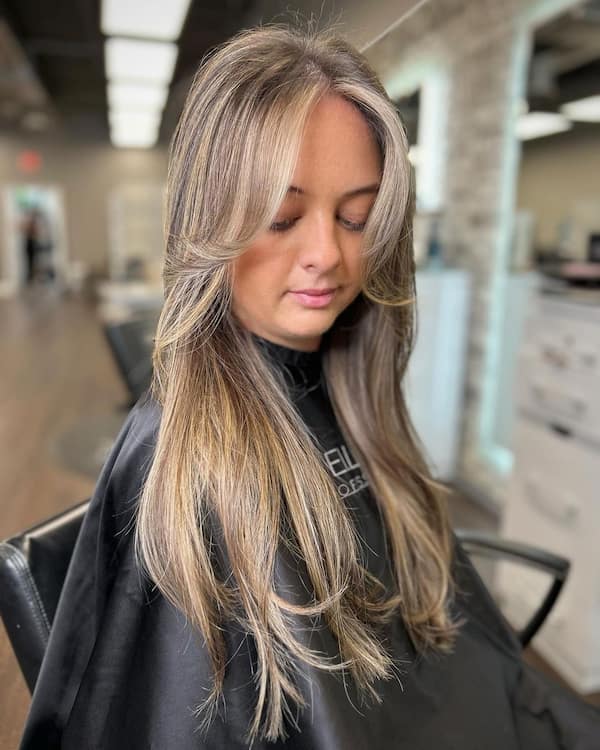 Blonde Balayage Layered Butterfly Haircut with Curtain Bangs