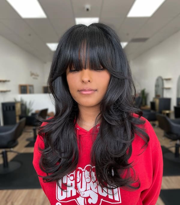 Cute Layered Haircut with Full Fringe