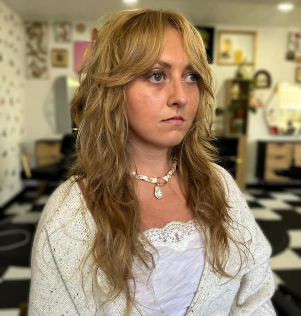 Light Wavy Shag Haircut with Curtain Bangs