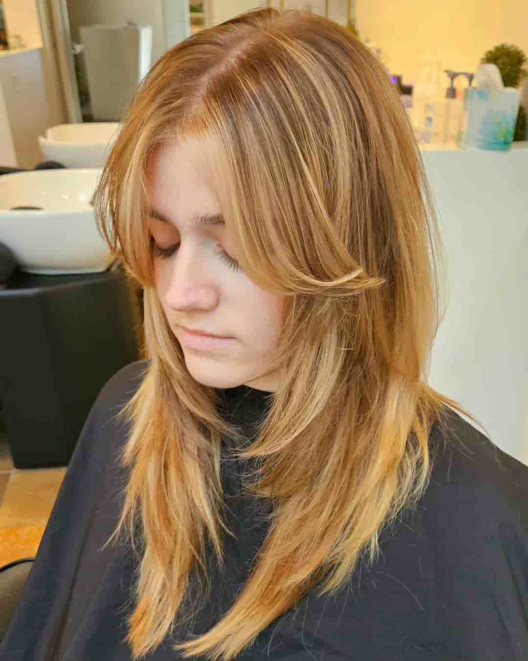 Modern Shaggy Haircut with Layers and Curtain Bangs