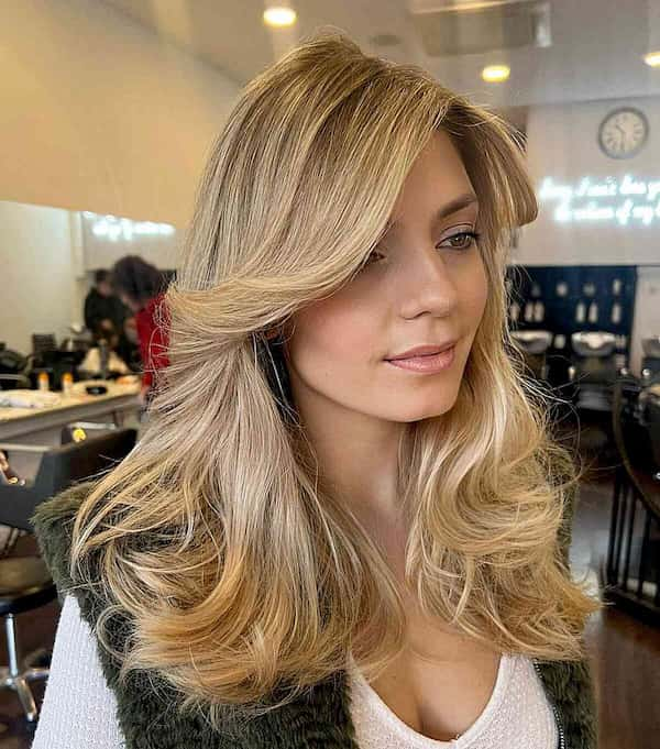 Voluminous Butterfly Blonde Haircut