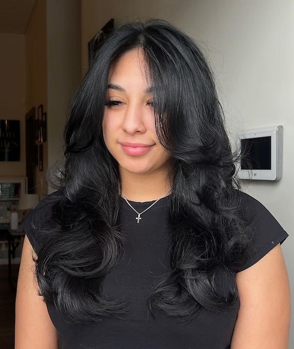 Wavy Layered Haircut with Bangs