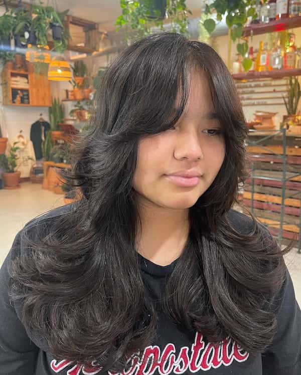 Wolf Haircut with Curtain Bangs for Thick Hair