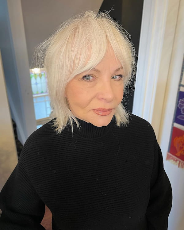 Grey Bob Haircut with Curtain Bangs for Older Women