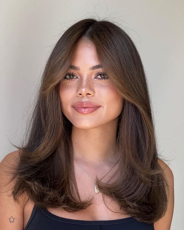 Brown Mid-Length Hair with Layers and Bangs