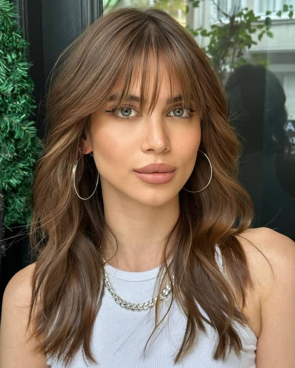 Layered Brown Medium Length Haircut with Bottleneck Bangs