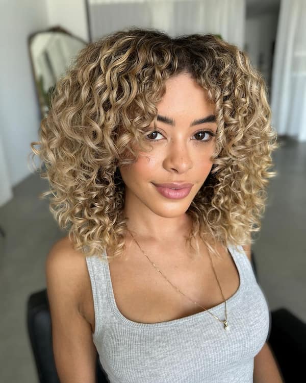 Layered Curly Hair with Bangs