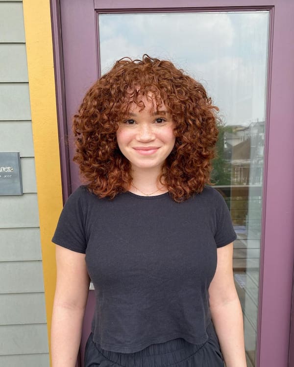 Light Brown Curly Hair with Bangs for Round Face