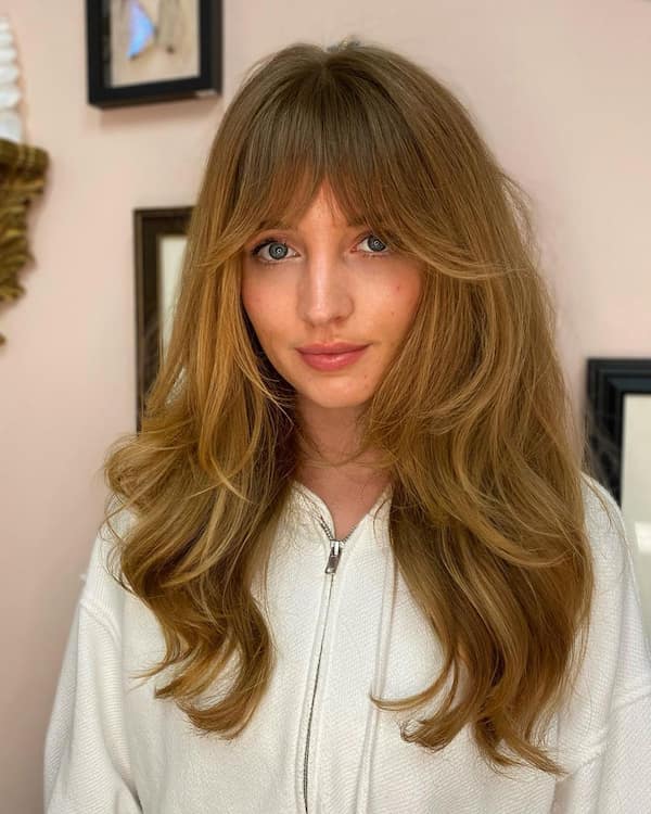 Long Layered Haircut with Curtain Bangs