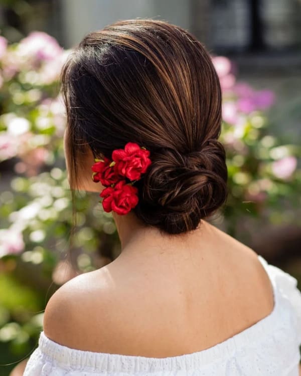 Low Bun Hairstyle with Rose