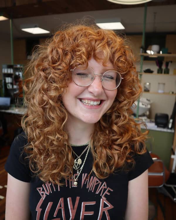 Mid-Length Curly Hair with Bangs