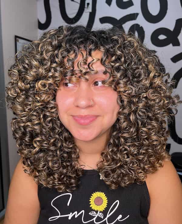 Shoulder-Length Face Framing Curly Hair with Highlights
