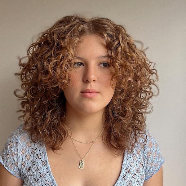 Simple Curly Haircut with Curtain Bangs