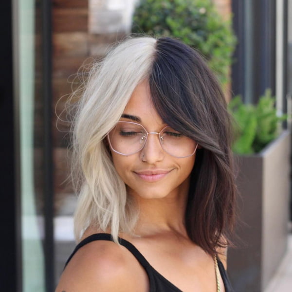 Split Bleach and Black Layered Haircut with Bangs