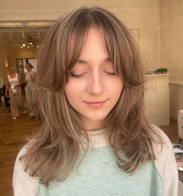 Sun-kissed Shag Haircut with Curtain Bangs