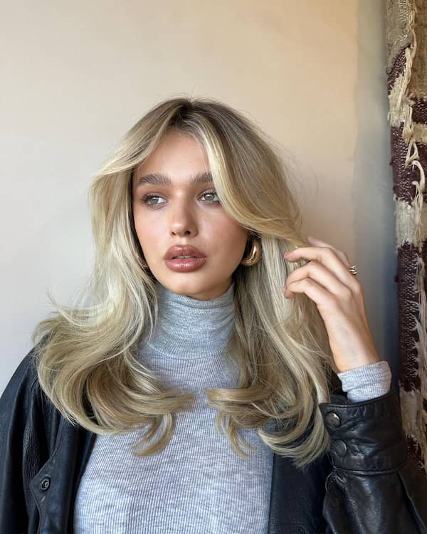 Textured Wavy Hair with Curtain Bangs