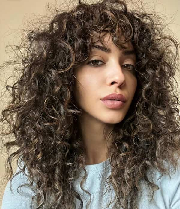 Voluminous Hair with Bold Curls