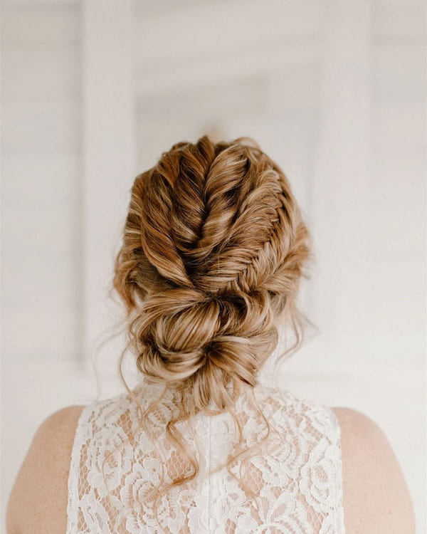 Large Twisted Infused Low Bun Bridal Hair