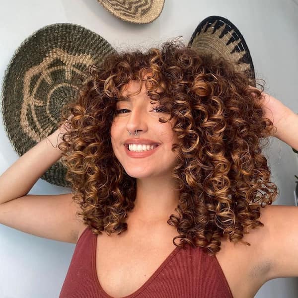 Short Voluminous Curly Hair with Bangs