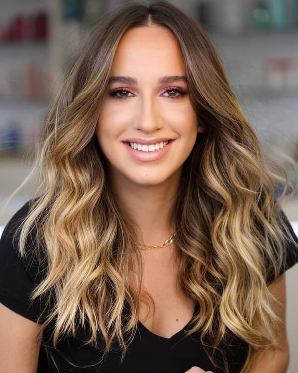 Center-Parted Wavy Haircut with Highlights