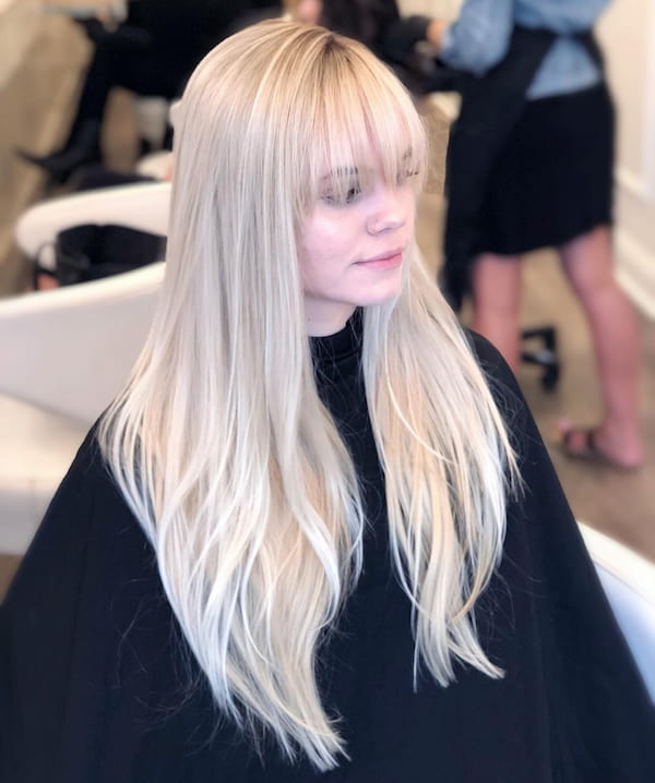 Full Blonde Haircut with Fringe