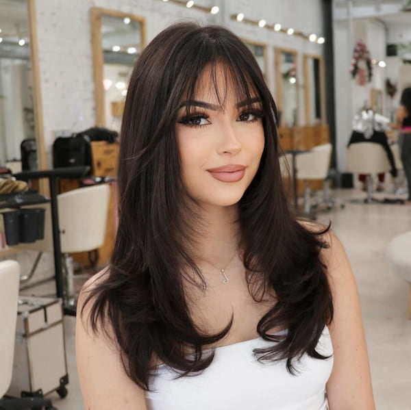 Layered Haircut with Wispy Bangs