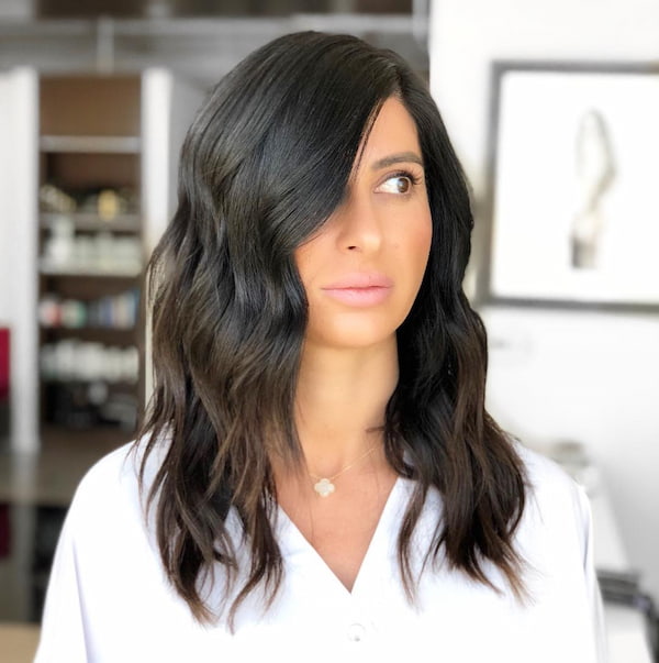 Mid-length Wavy Haircut with Long Layers