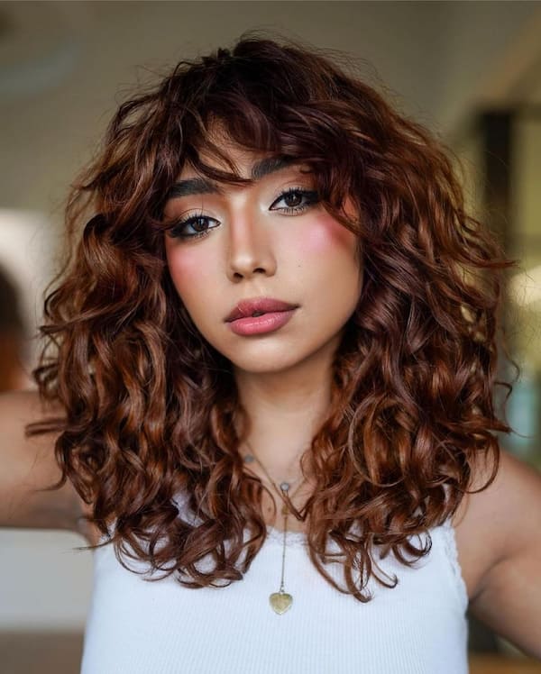 Textured Copper Wavy Haircut with Bangs