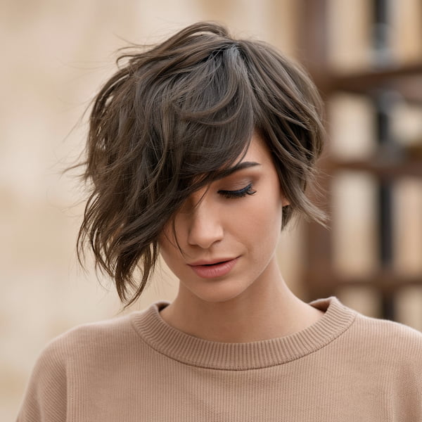Thick Wavy Pixie with Long Side Swept Bangs