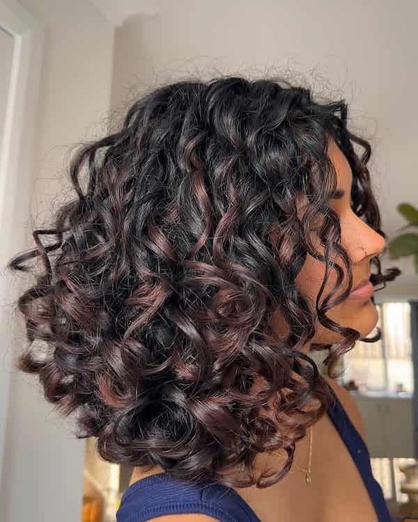 Bouncy Mid-Length Curly Haircut