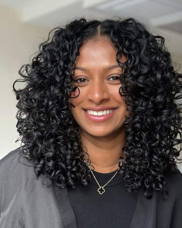 Center-Parted Curly Haircut