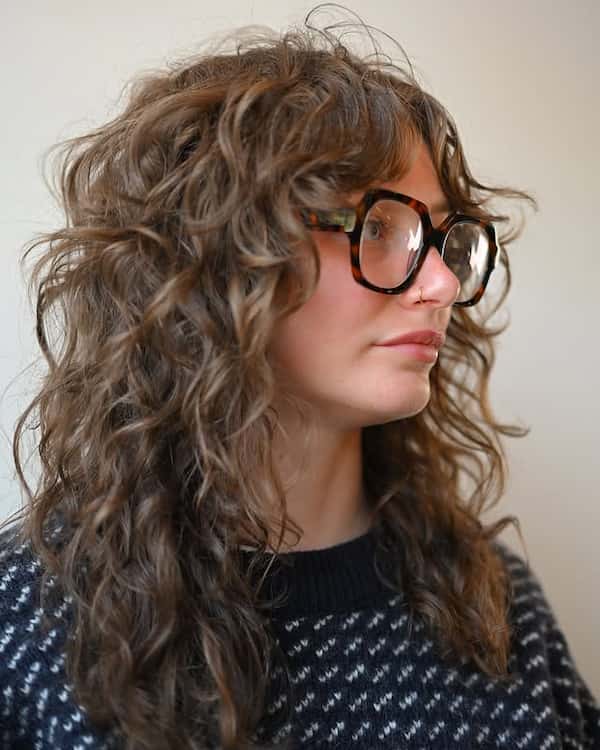 Curly Haircut with Curtain Bangs