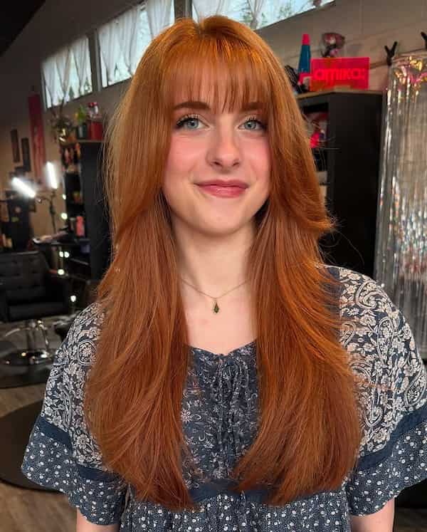 Brown Long Layered Haircut with Wispy Bangs 