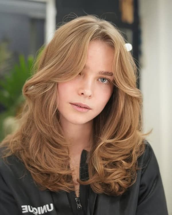 Layered Haircut with Curtain Bangs for Thin Hair 
