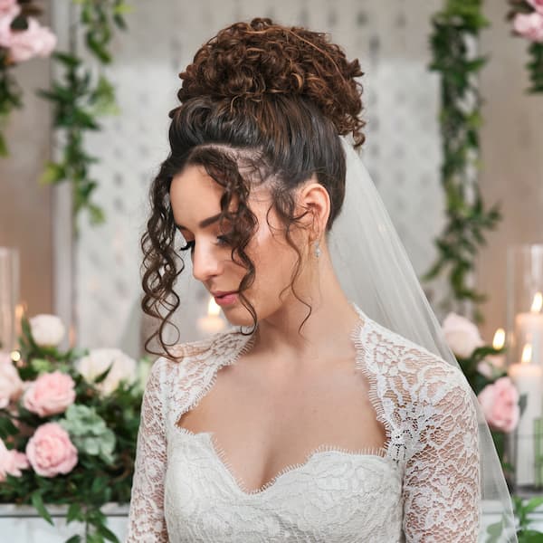 Modern Bridal Bun with Curtain Bangs 