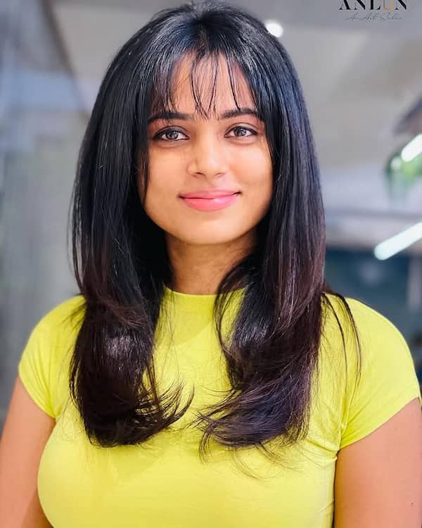 Subtle Textured Mid-Length Hair with Wispy Bangs 