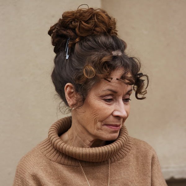 Thick Bun with Bangs for Older Women