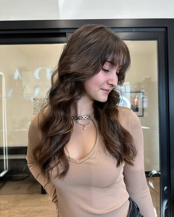 Simple Wavy Haircut with Choppy Bangs 