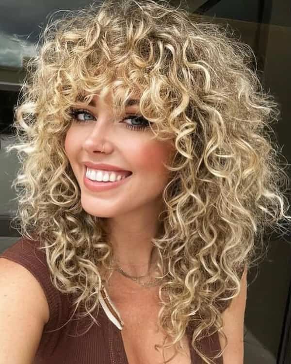 Thick Blonde Shaggy Haircut for Long Hair 