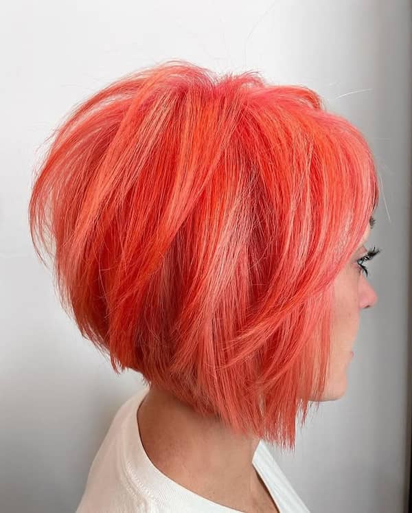 Reddish Layered Bob with Curtain Bangs