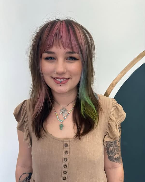 Multi-Colored Mid-Length Haircut with Wispy Bangs