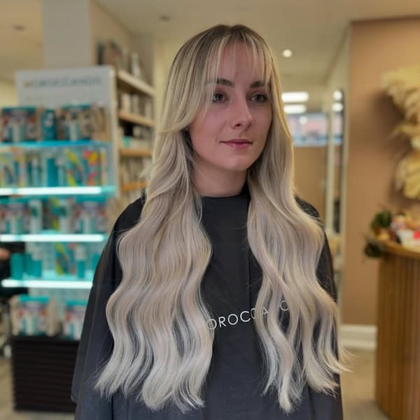 Arched Wispy Bangs with Long Waves